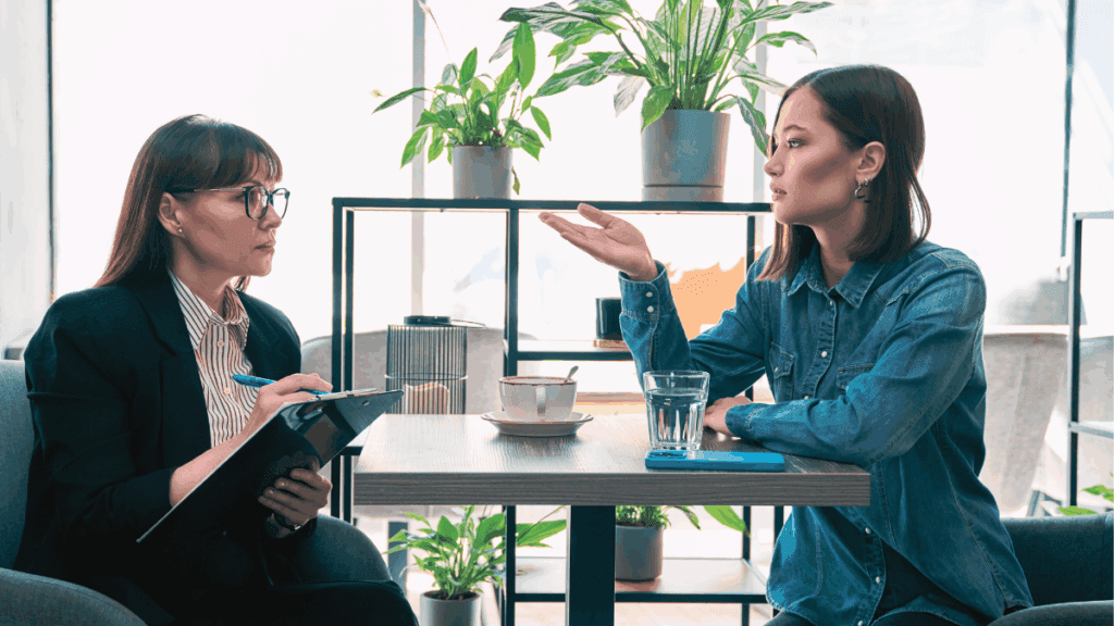 Clinicians reviewing Talking Therapies patient pathways, representing strong governance and efficient wait list management.