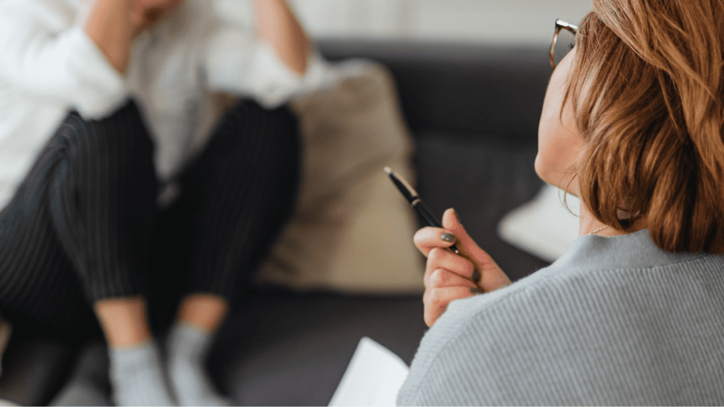 Mental health clinician improving patient access and flow in a UK therapy service